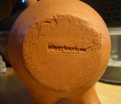 Piggy Stamp logo back